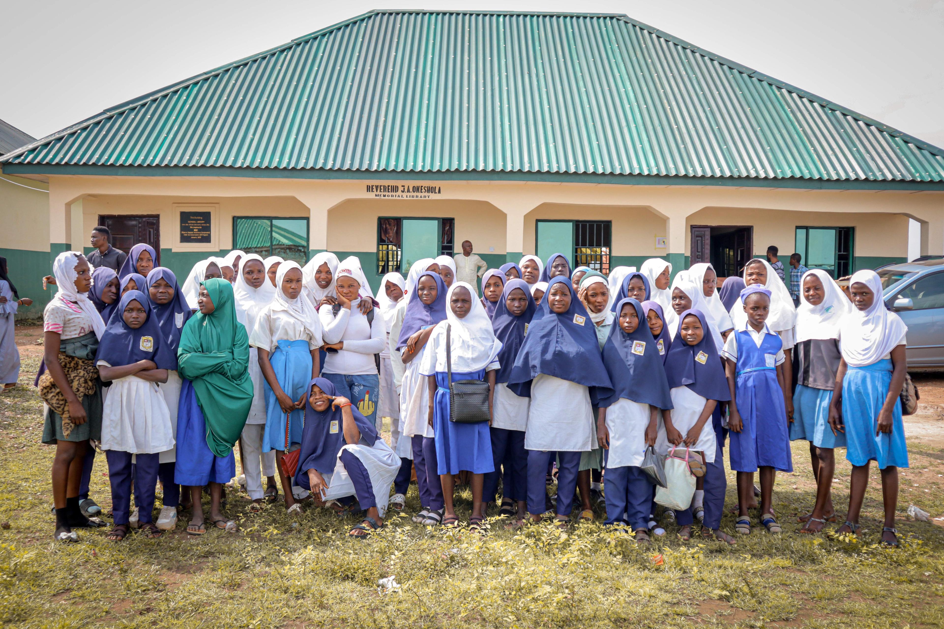 Students gathered after a community learning programme